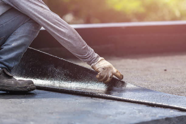 Professional Exterior Waterproofing technician working in Johnson City, NY